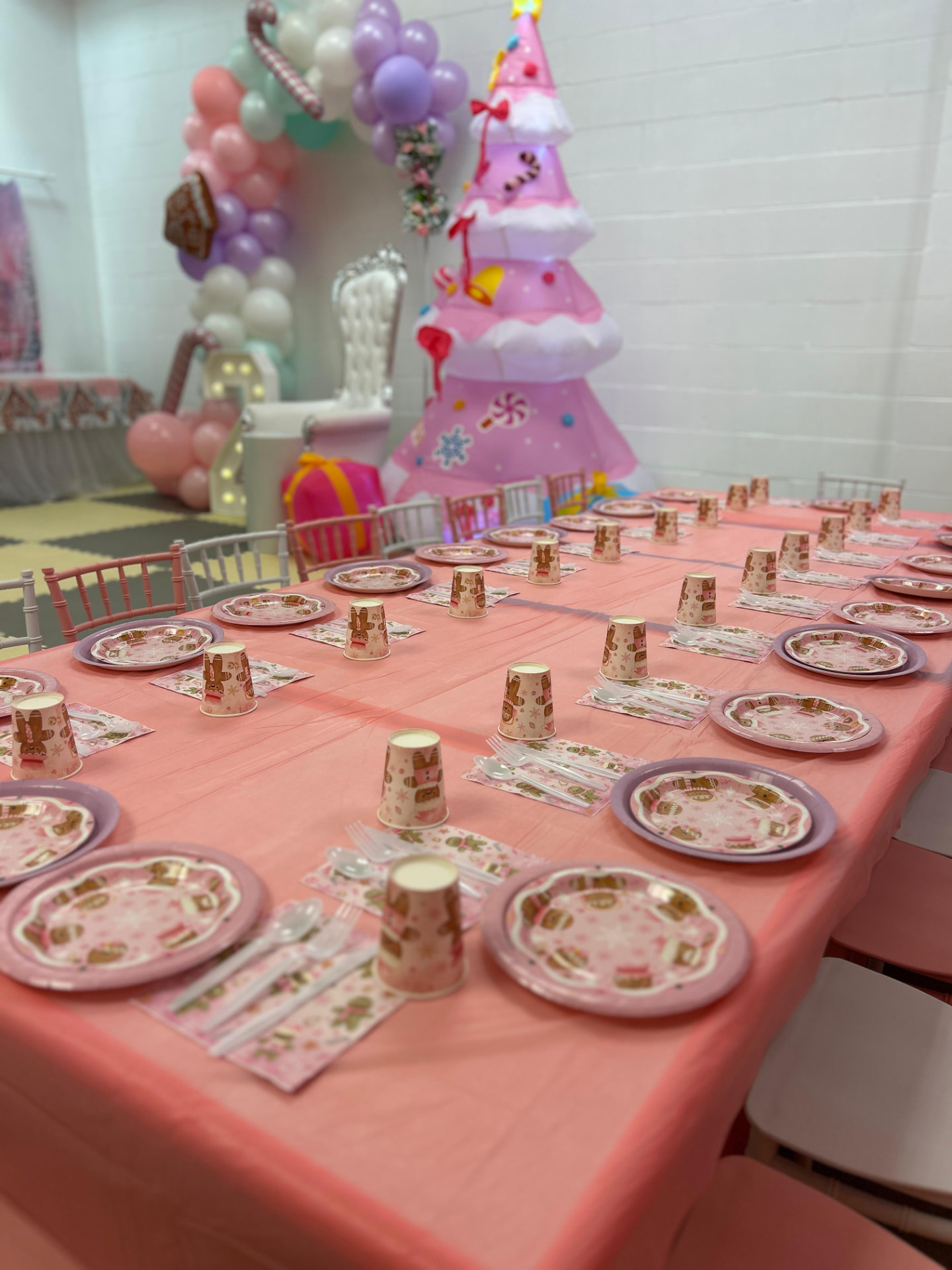Pink Christmas birthday party setup