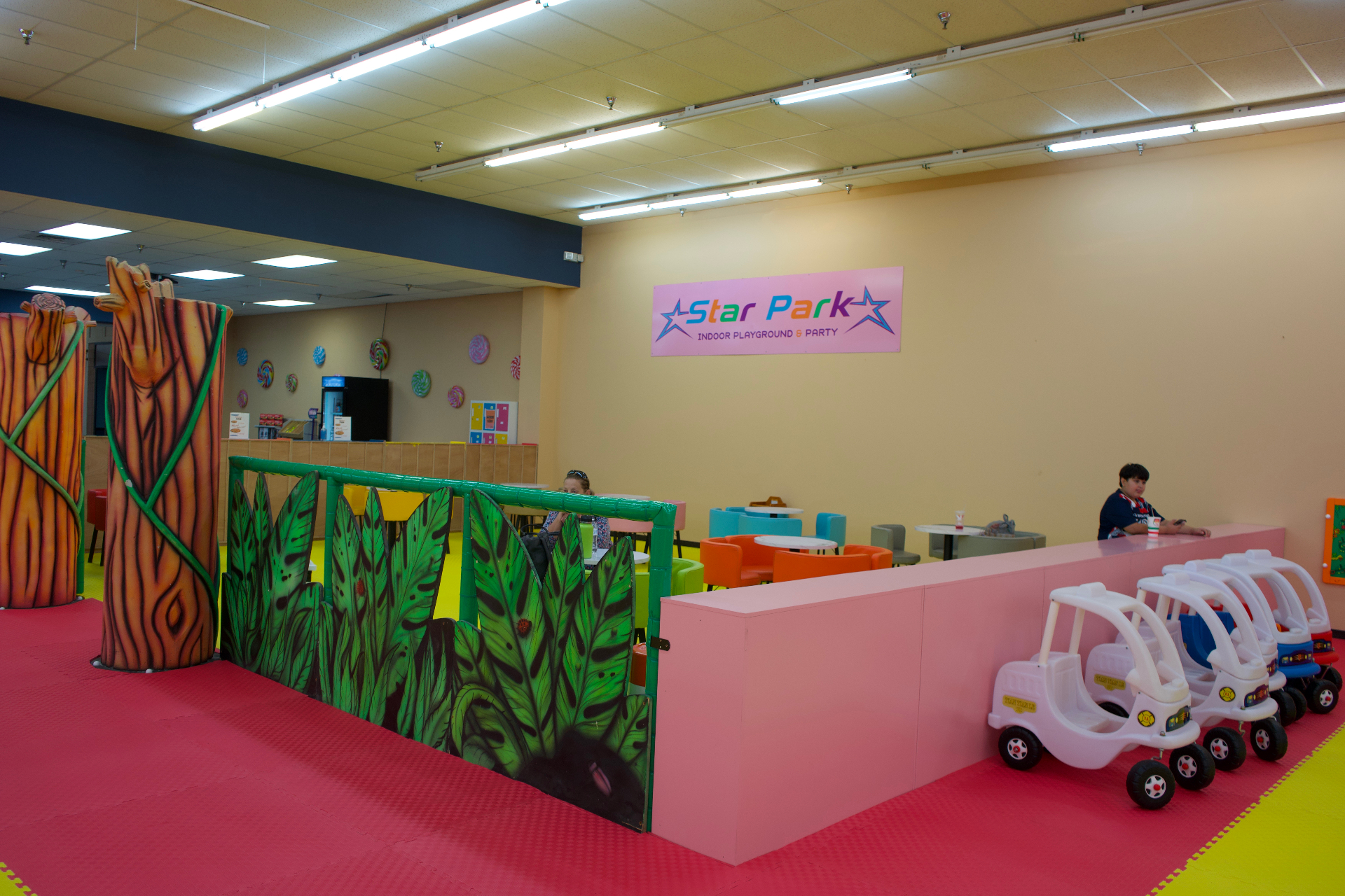 Seating lounge and small ride area at Star Park Allentown